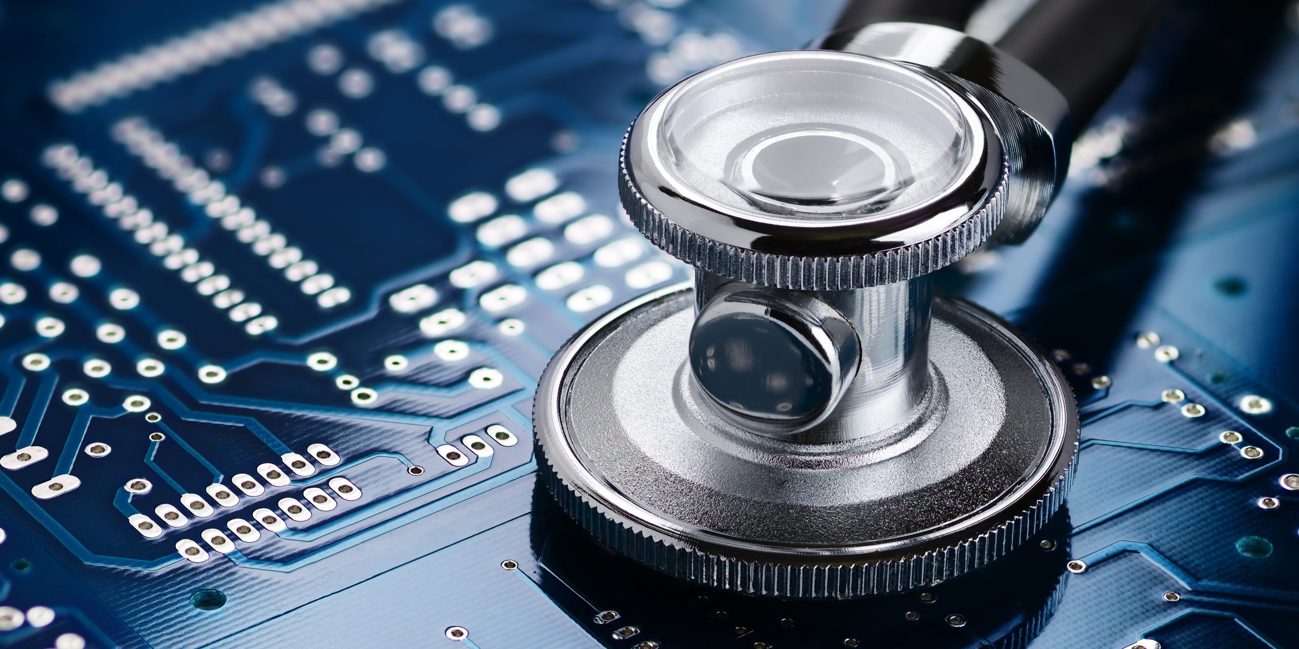 Medical stethoscope and electronics Medical stethoscope diagnosing a circuit board